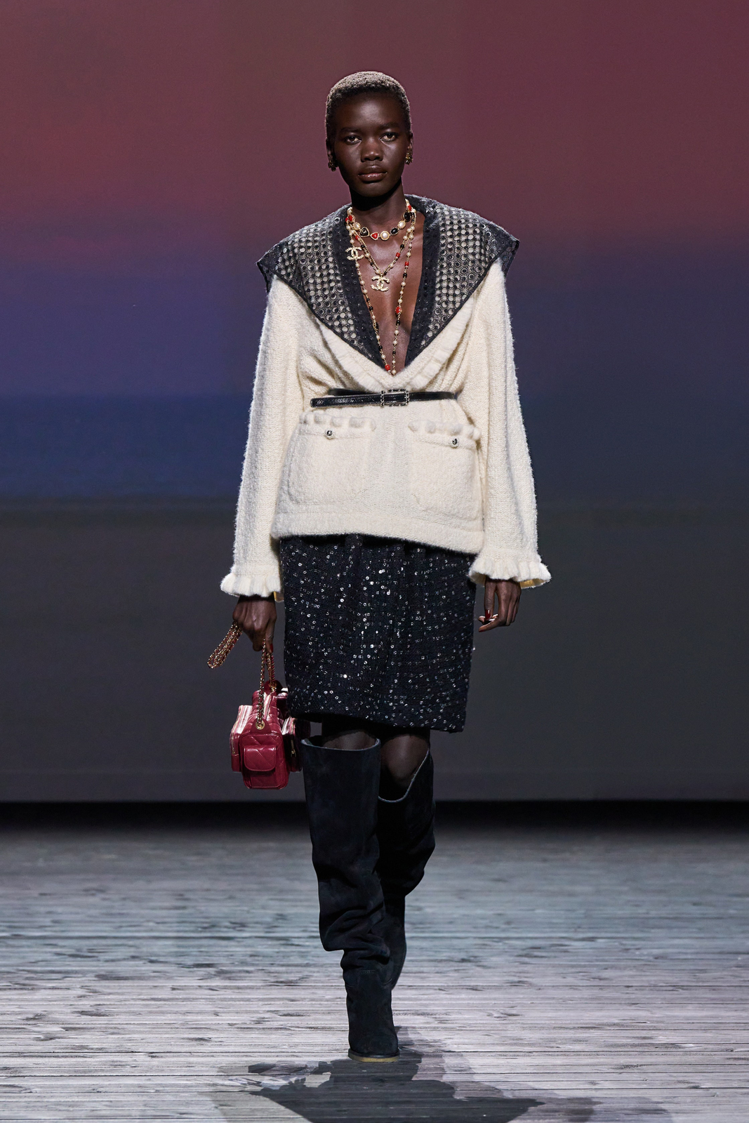 Runway Glamour: Black Suede Knee-High Boots with Sequined Skirt Suede Boots Outfits