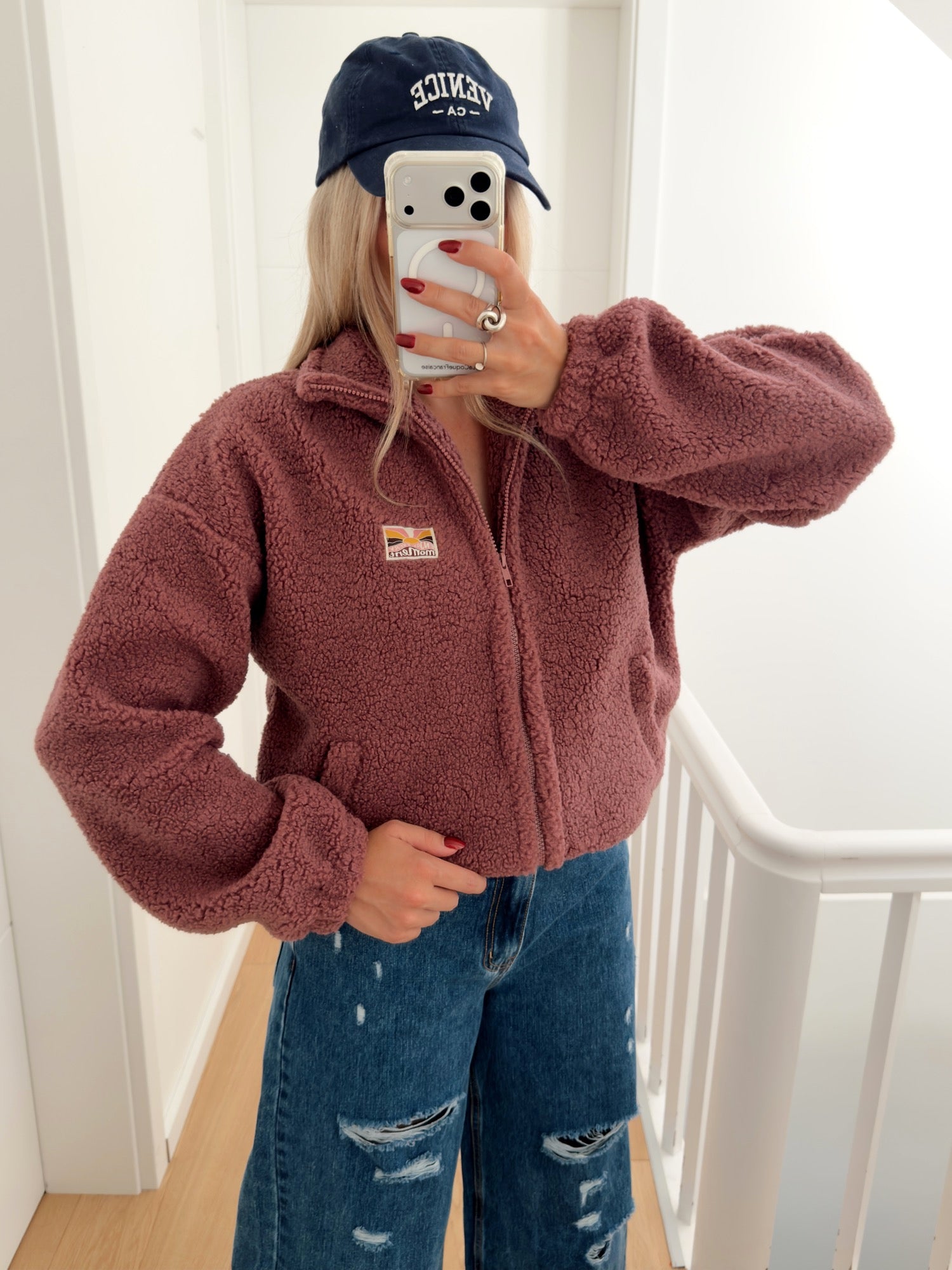Fleece Jacket and Distressed Denim for a Weekend Brunch — Winter Brunch Outfits