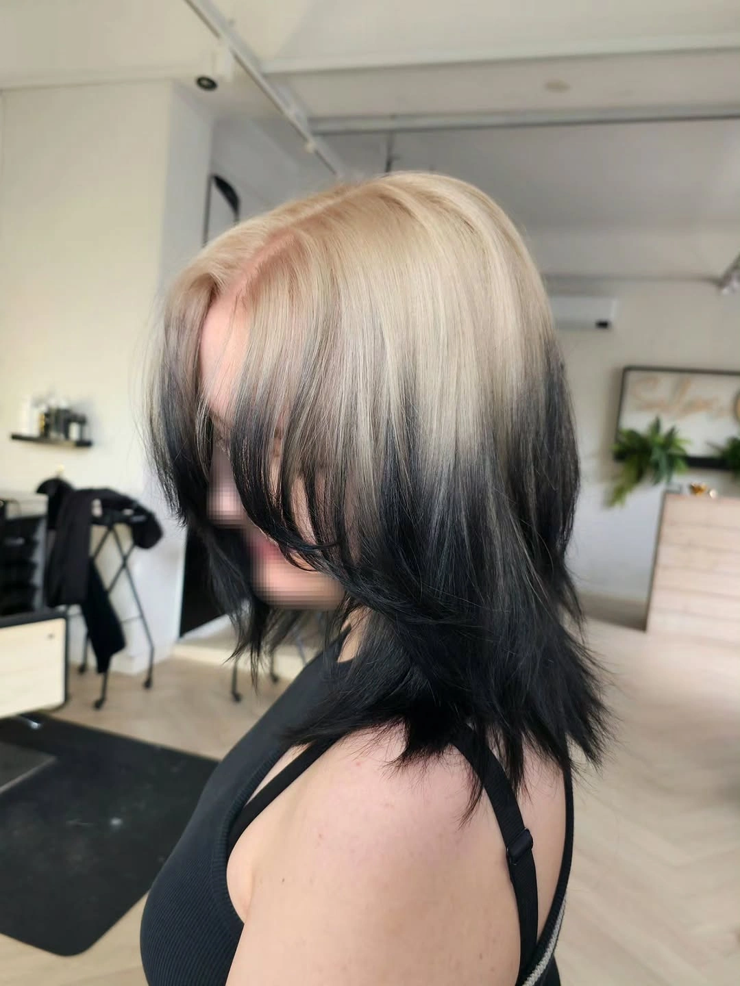 Short shaggy hair with pale blonde crown and black underlayers Short shaggy hair with pale blonde crown and black underlayers