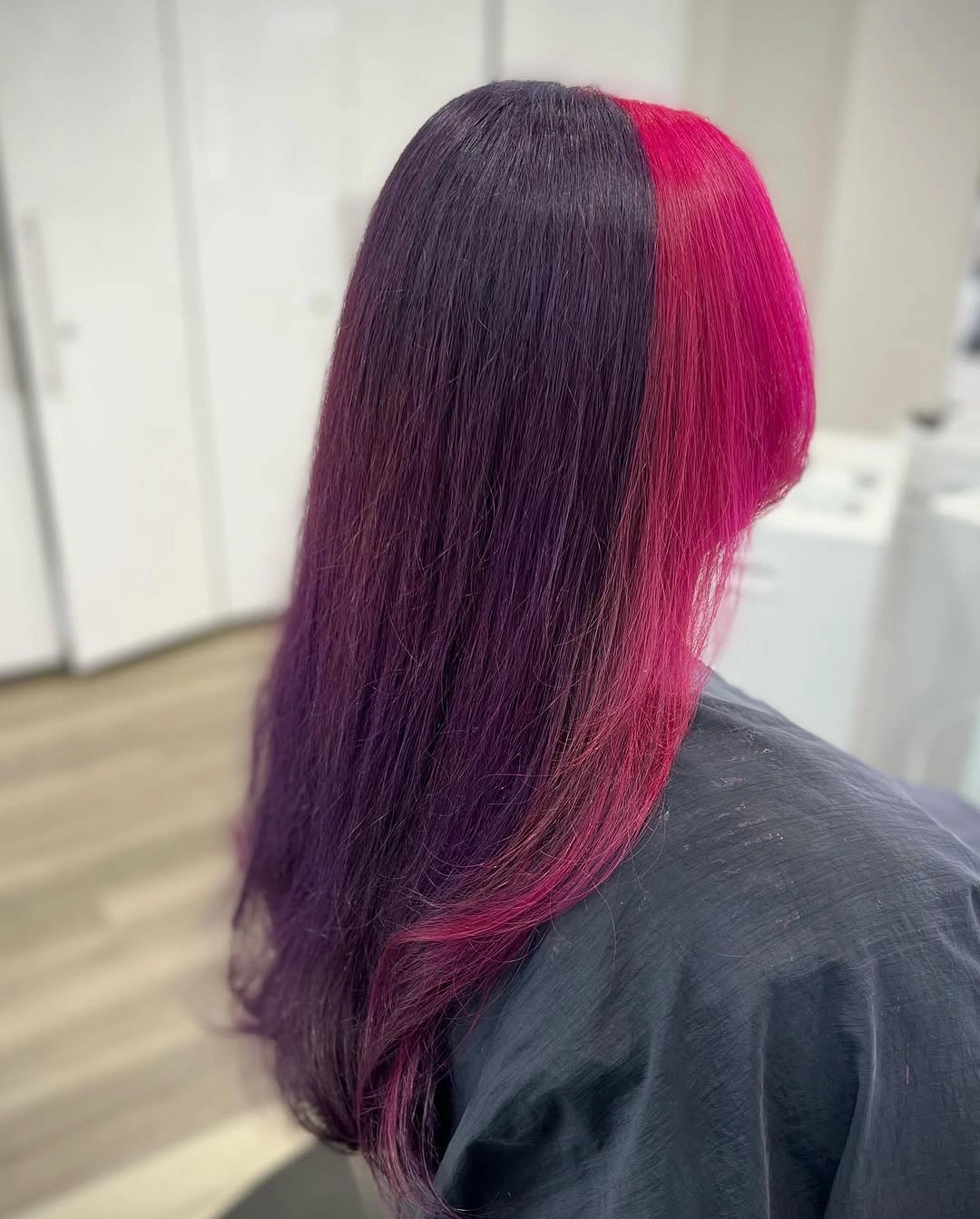 Long straight purple hair with vivid fuchsia right side section Long straight purple hair with vivid fuchsia right side section