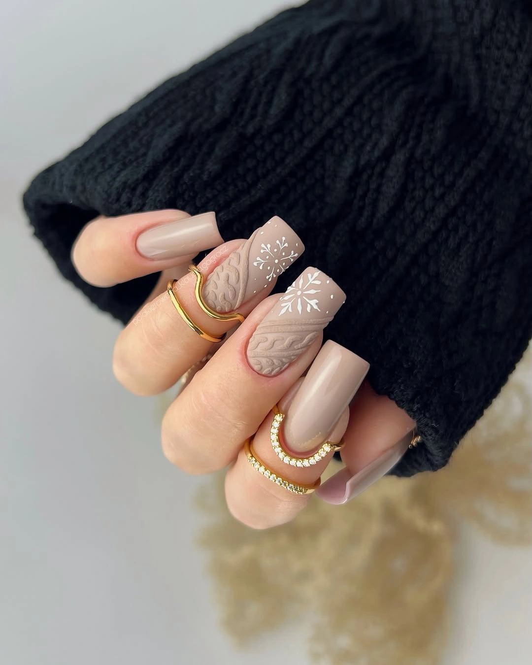 Square warm taupe nails with raised knit patterns and white snowflakes Square warm taupe nails with raised knit patterns and white snowflakes