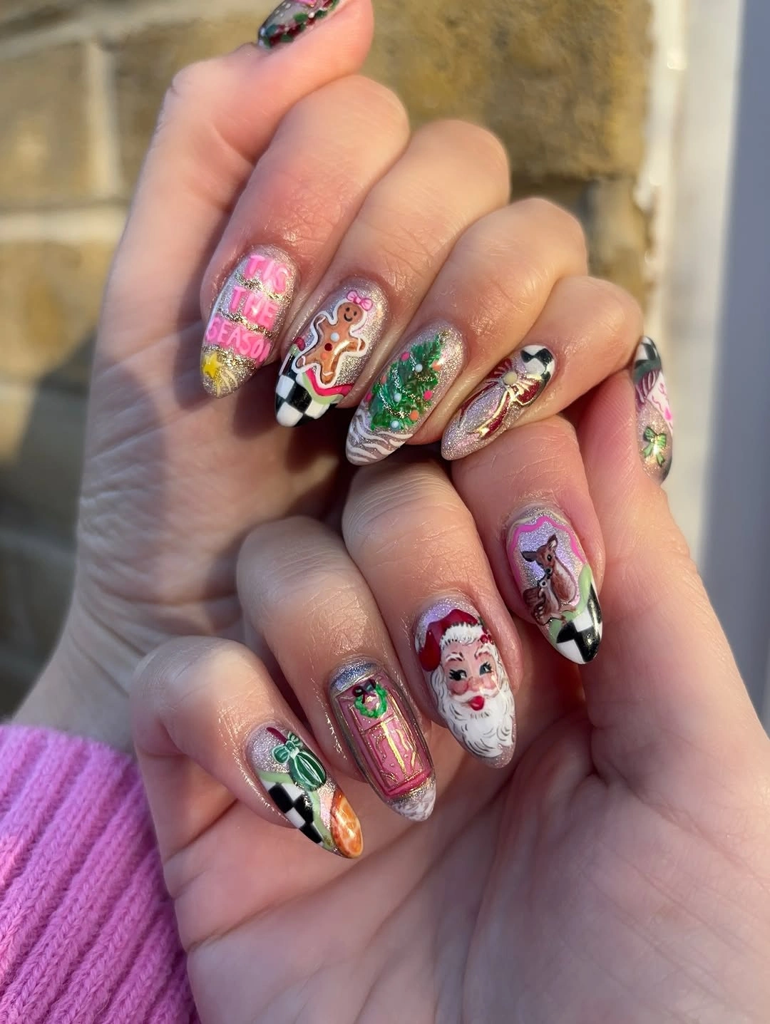Long Christmas nails with Santa gingerbread tree gifts and checkerboard accents Long Christmas nails with Santa gingerbread tree gifts and checkerboard accents