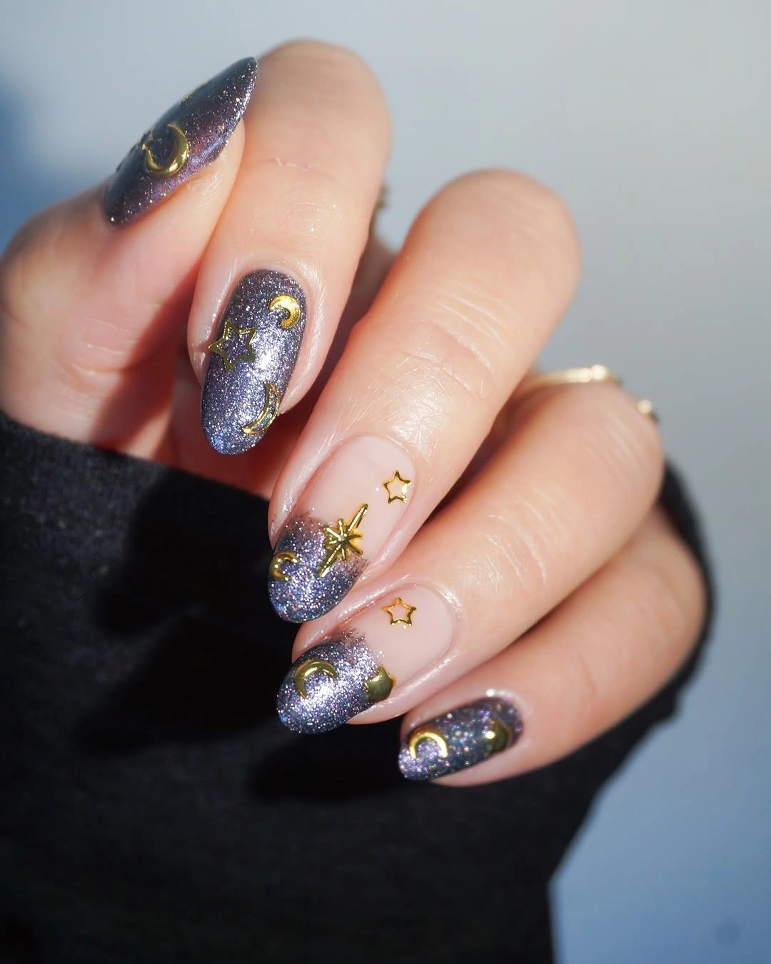 Almond nails with smoky purple glitter gold moons and star accents Almond nails with smoky purple glitter gold moons and star accents