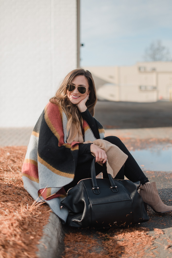 Striped Poncho for a Relaxed Travel Vibe — Winter Travel Outfits