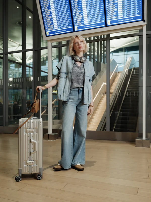 Denim Vest Layering: Knit Sweater with Wide-Leg Jeans Denim Vest Layering: Knit Sweater with Wide-Leg Jeans β Winter Airport Outfits