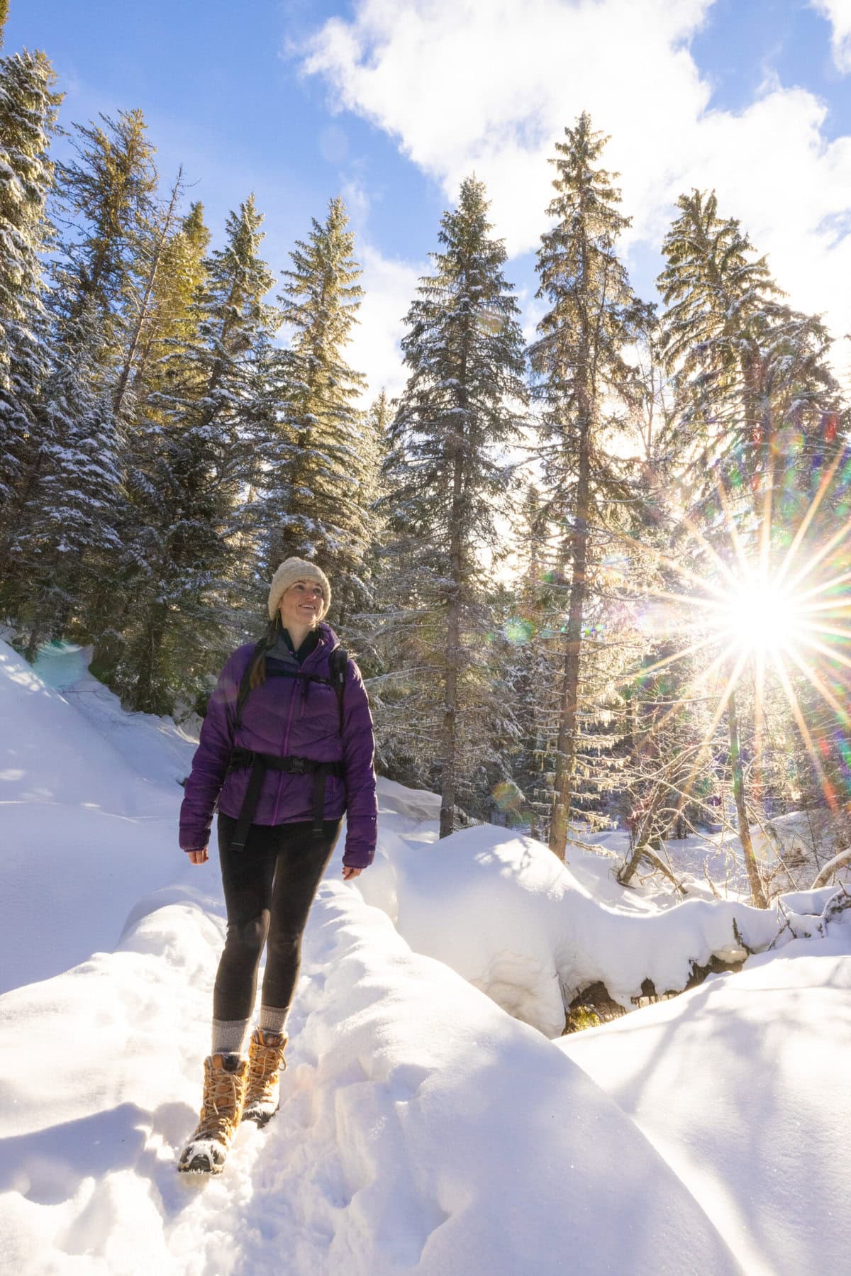 Vibrant Purple Puffer Jacket and Dark Grey Leggings — Winter Hiking Outfits