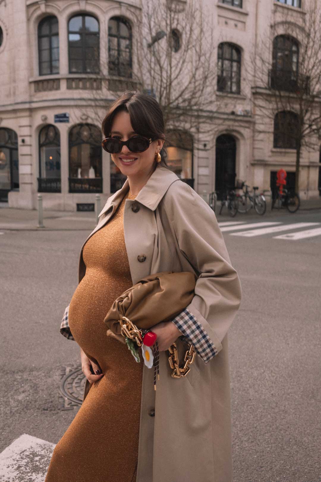 Sparkly Gold Knit Dress with a Beige Trench Coat Sparkly Gold Knit Dress with a Beige Trench Coat β Winter Maternity Outfits