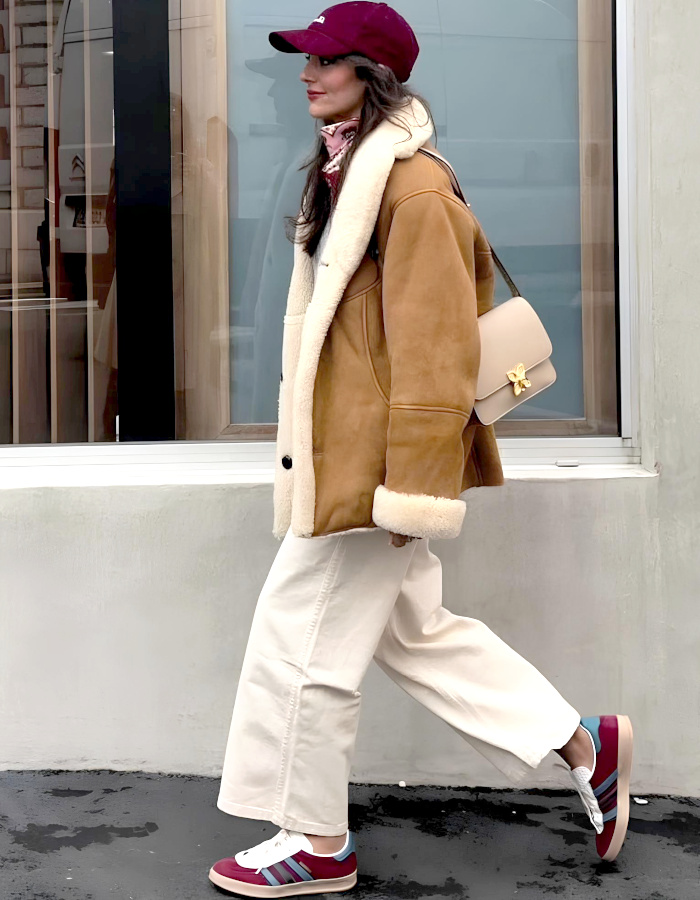 Cozy Comfort: Shearling Jacket and Sneakers with Cream Wide Leg Jeans — Winter Outfits with Wide Leg Jeans