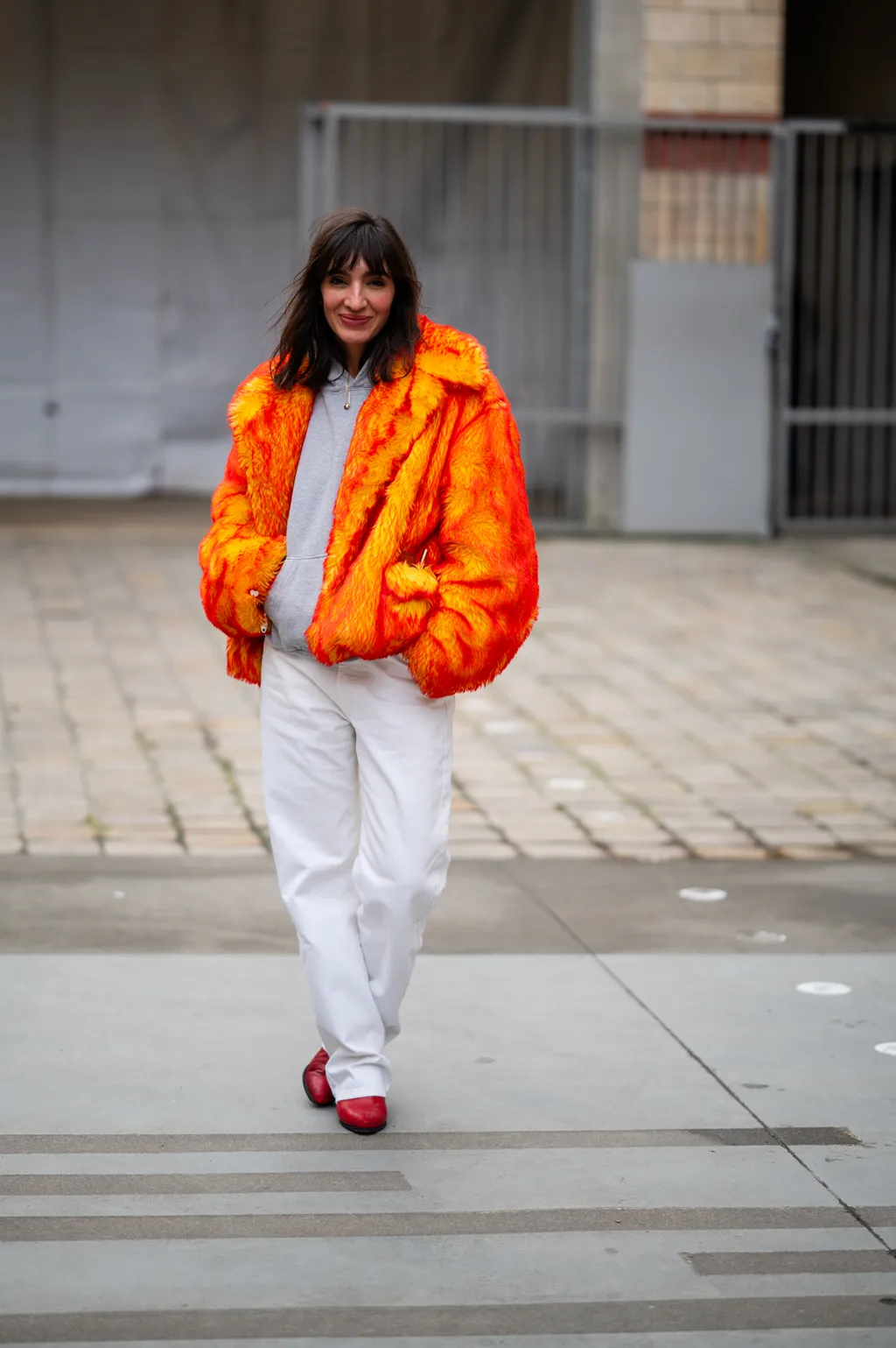 Vibrant Orange Faux Fur Coat with White Trousers Vibrant Orange Faux Fur Coat with White Trousers β Paris Winter Outfits