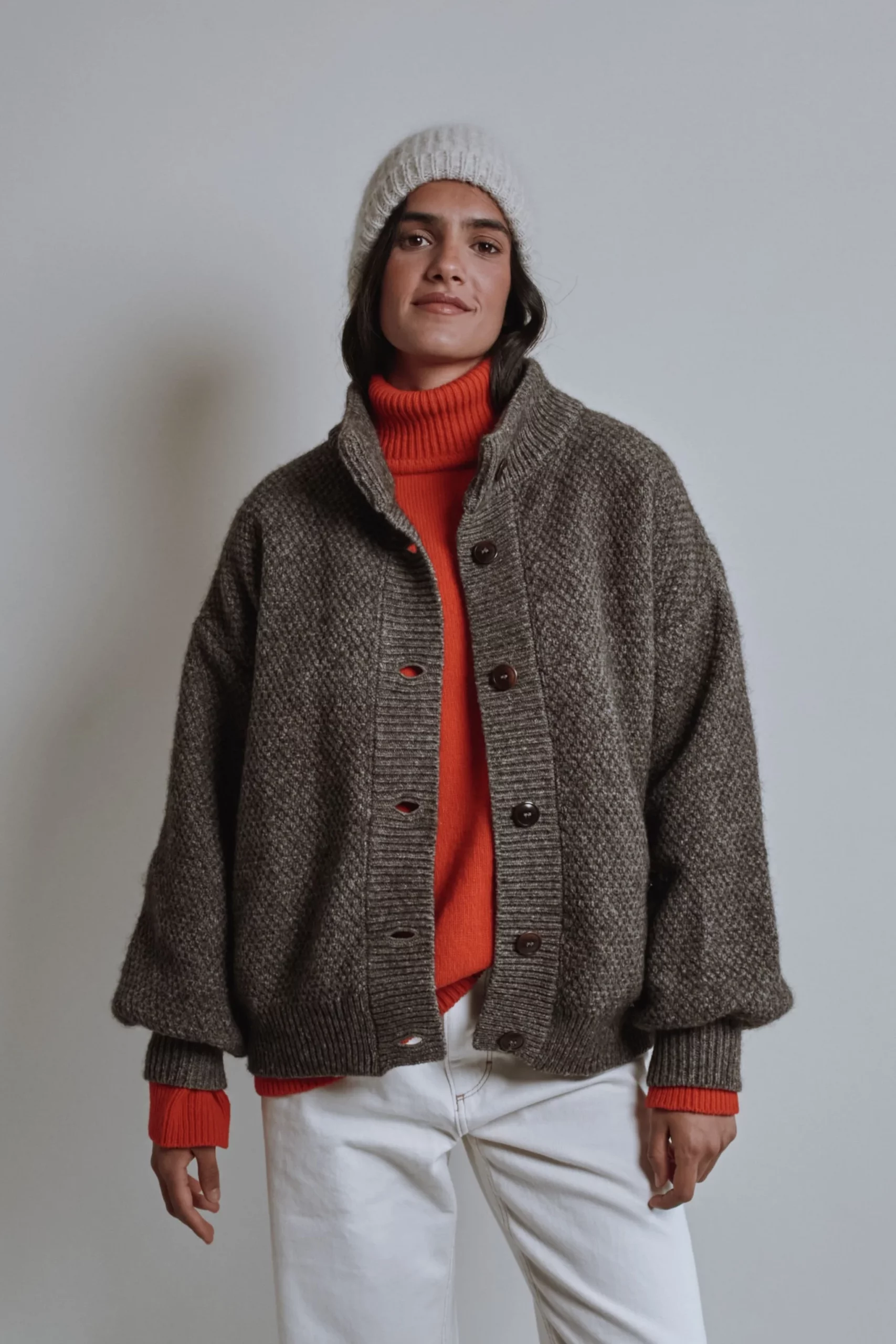 Bright Orange Turtleneck Under Grey Cardigan Bright Orange Turtleneck Under Grey Cardigan β Iceland Winter Outfits