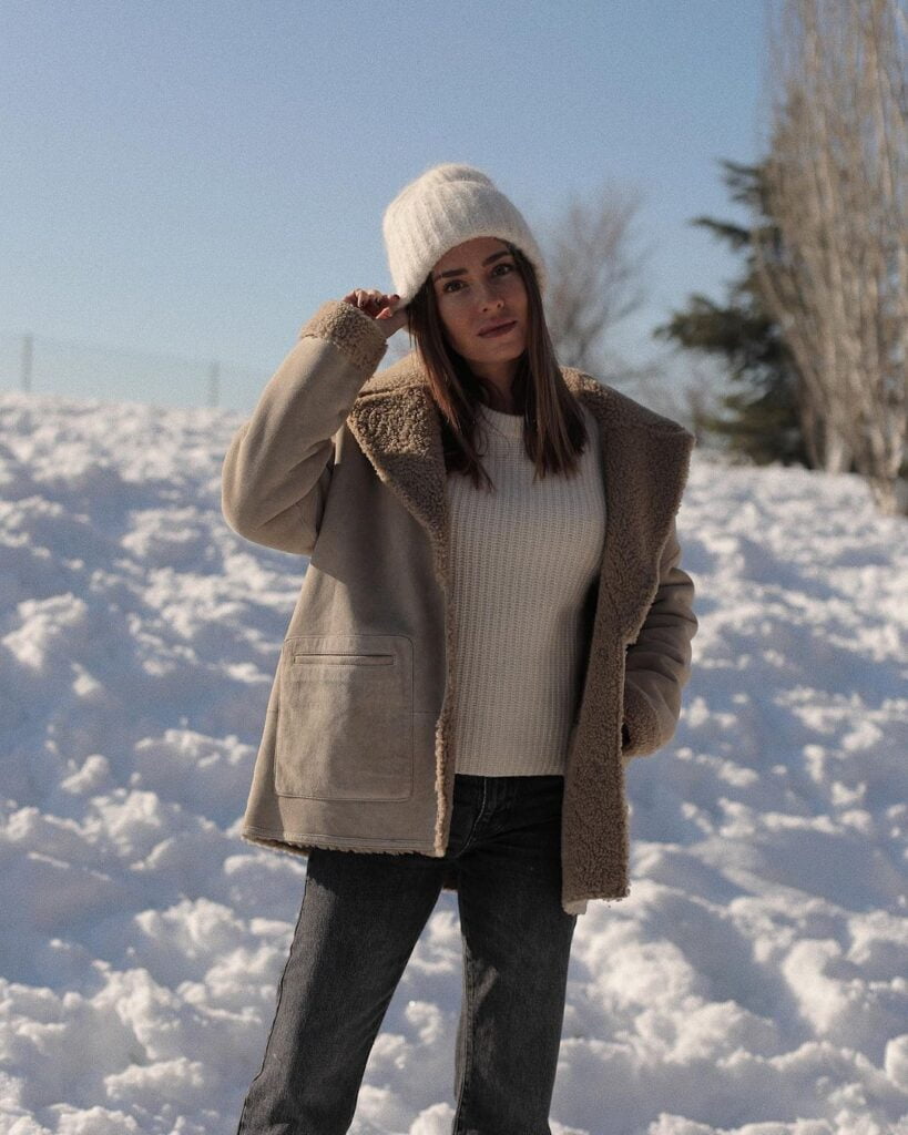 Relaxed Beige Shearling-Lined Jacket with Knit Sweater and Grey Denim Relaxed Beige Shearling-Lined Jacket with Knit Sweater and Grey Denim โ Shearling Coat Outfits