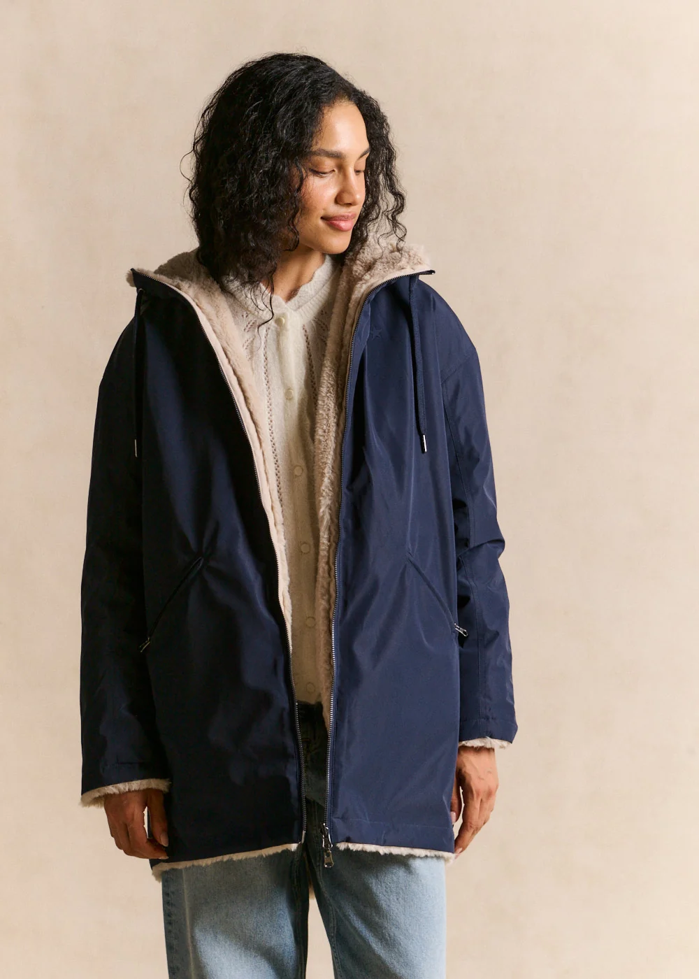 Navy Reversible Parka with Fuzzy Lining Over Cardigan and Jeans — Parka Outfits