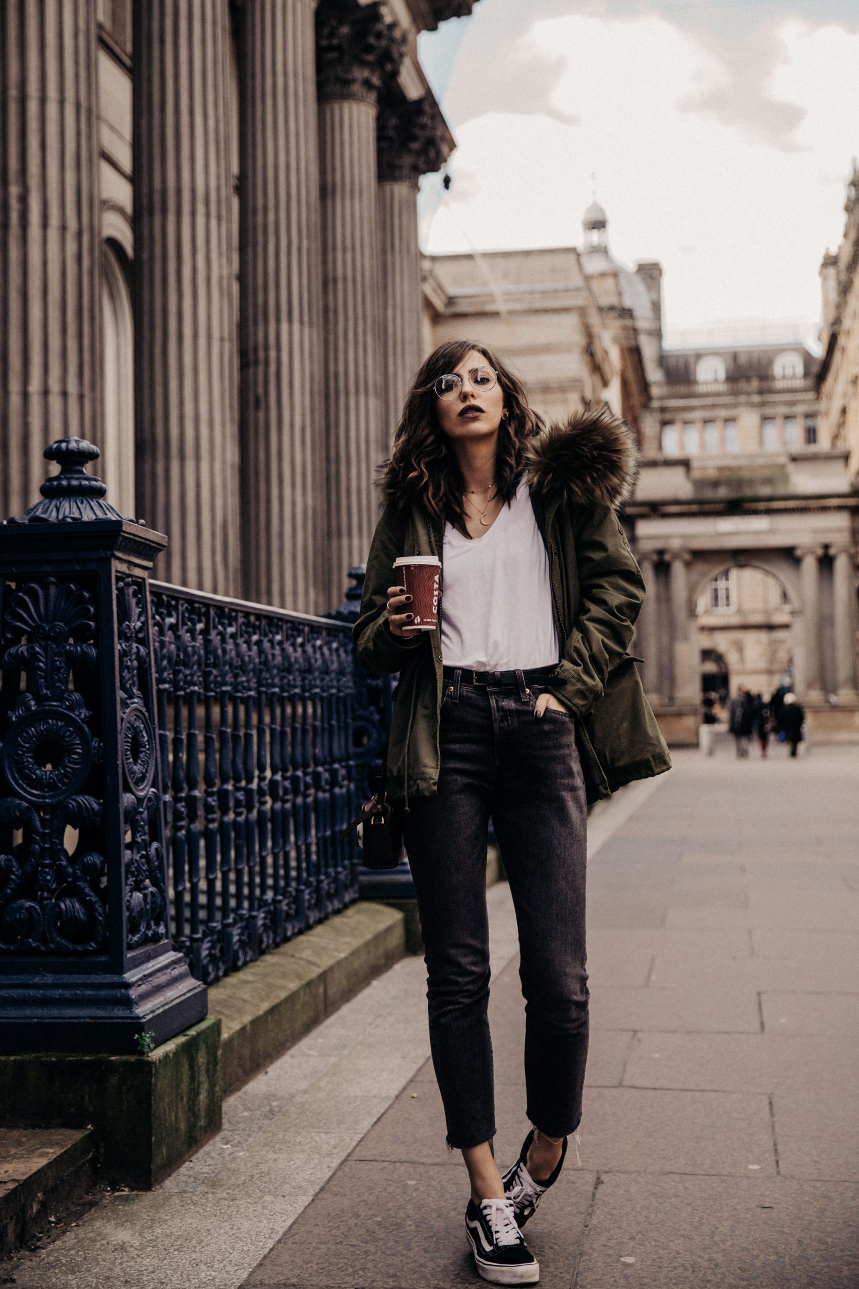 Green Parka with Fur Trim, Jeans, and Vans Sneakers — Parka Outfits