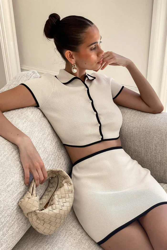 Cream Ribbed Knit Set with Contrast Trim Polo Top and Mini Skirt Cream Ribbed Knit Set with Contrast Trim Polo Top and Mini Skirt โ Knit Set Outfits