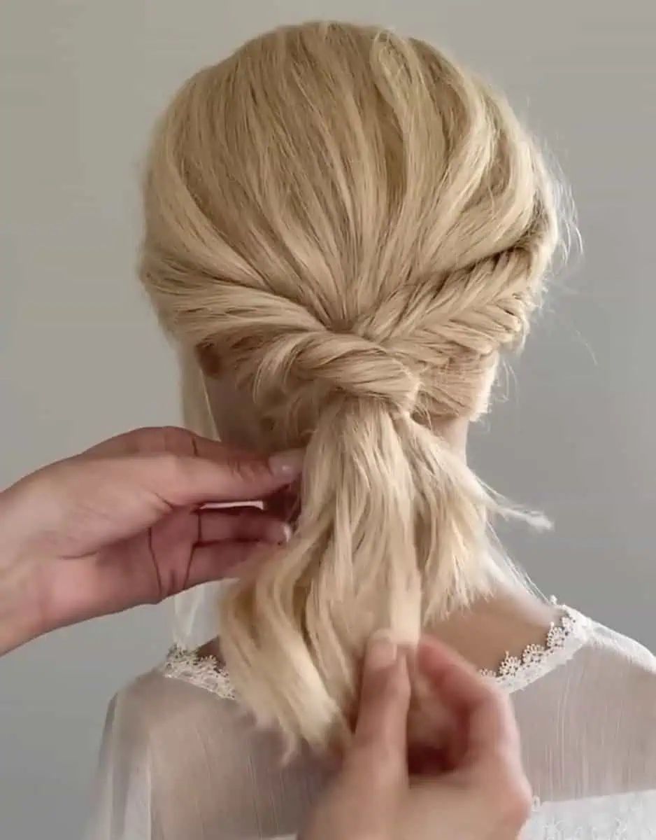 Low Twisted Ponytail With Waves Low Twisted Ponytail With Waves β Winter Hairstyles for Work