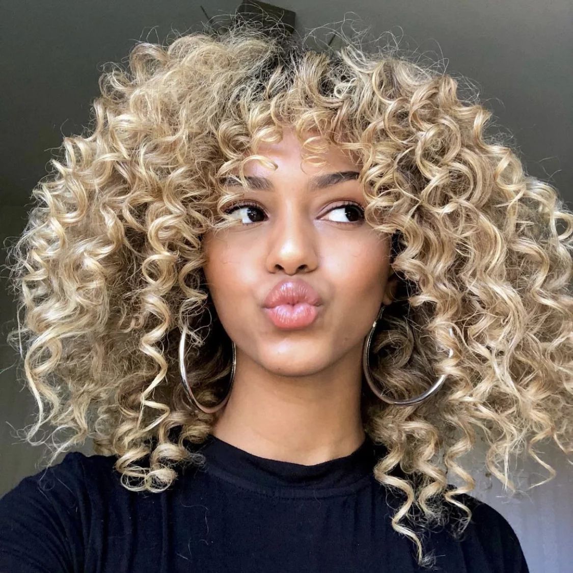 Voluminous Ash Blonde Curls With Bangs Voluminous Ash Blonde Curls With Bangs β Winter Hairstyles for Work