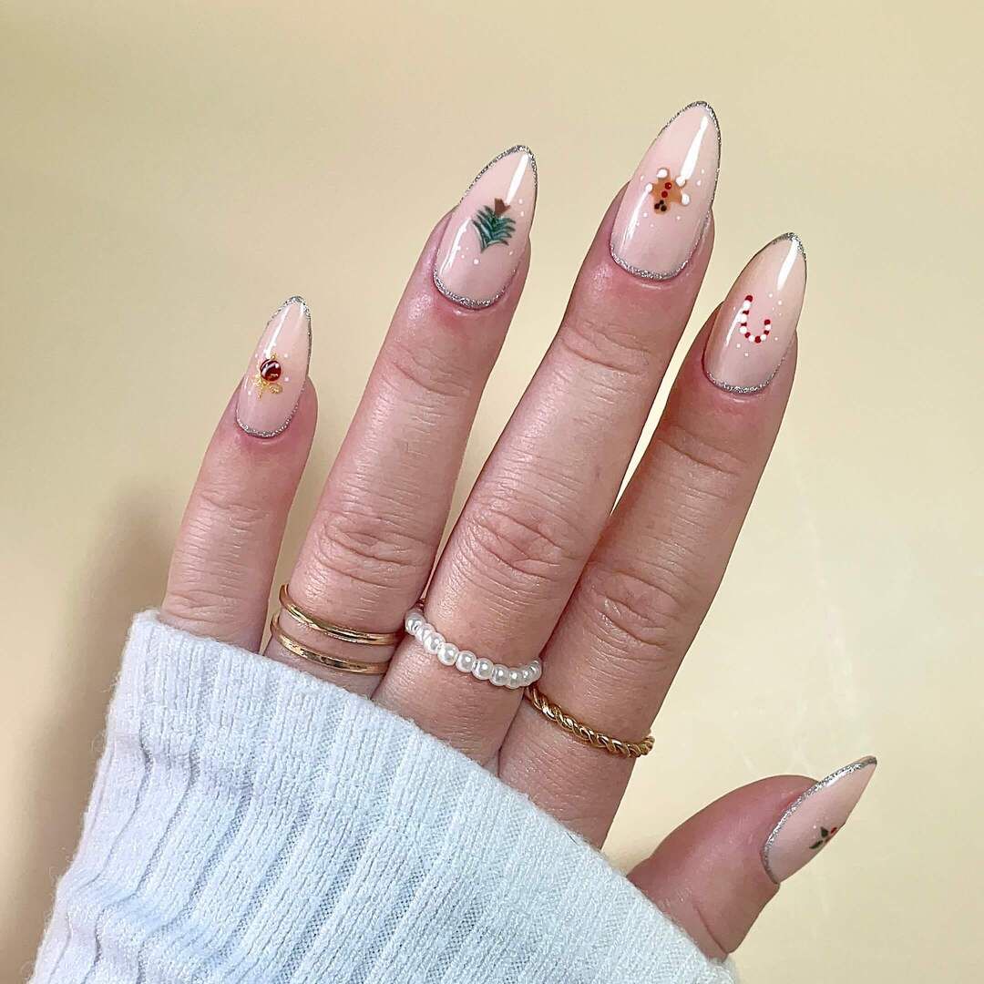 Sheer Nude Christmas Motifs Glitter Outline Sheer Nude Christmas Motifs Glitter Outline β Simple Christmas Nails 2026