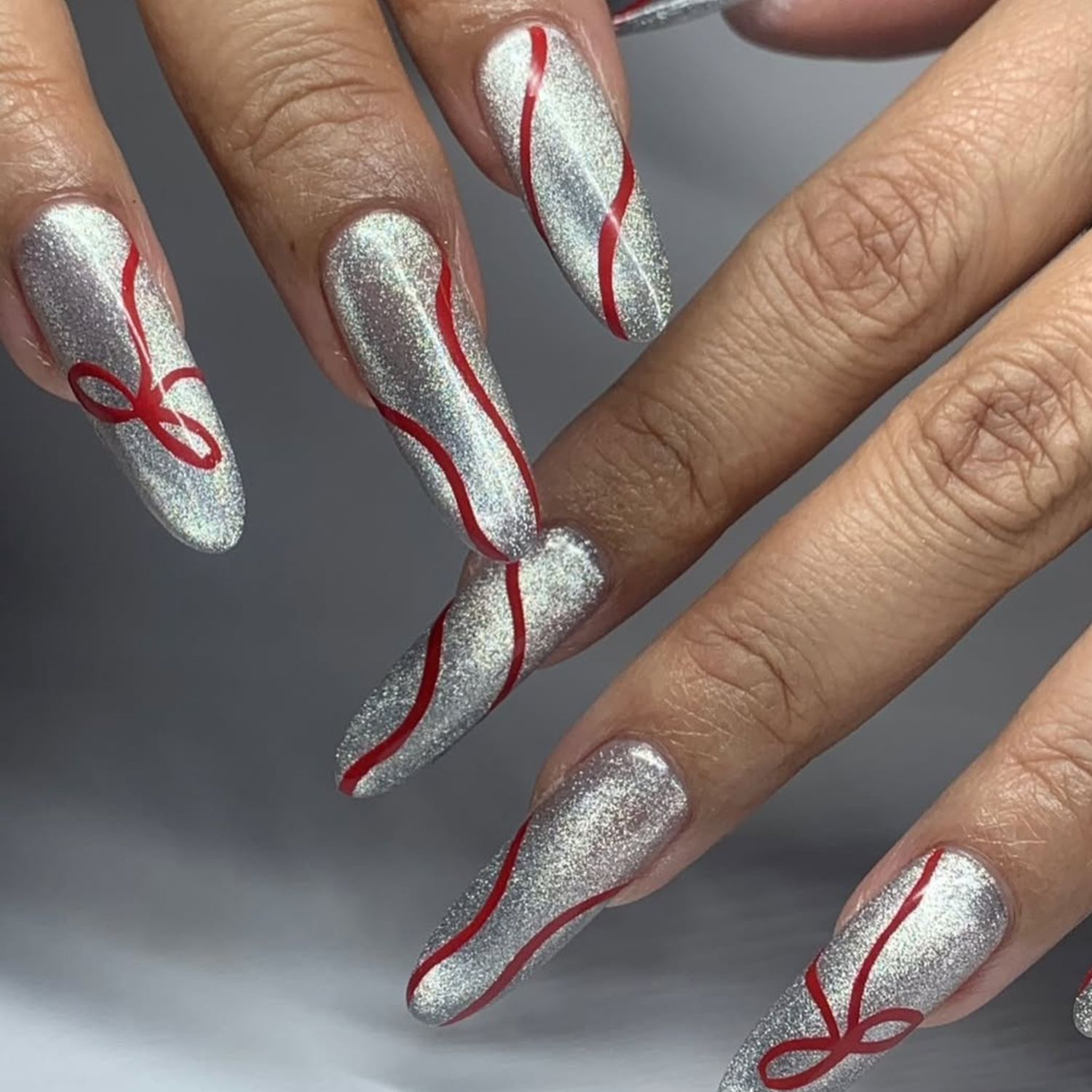 Holographic Silver Red Swirl Coffin — Long Christmas Nails 2026
