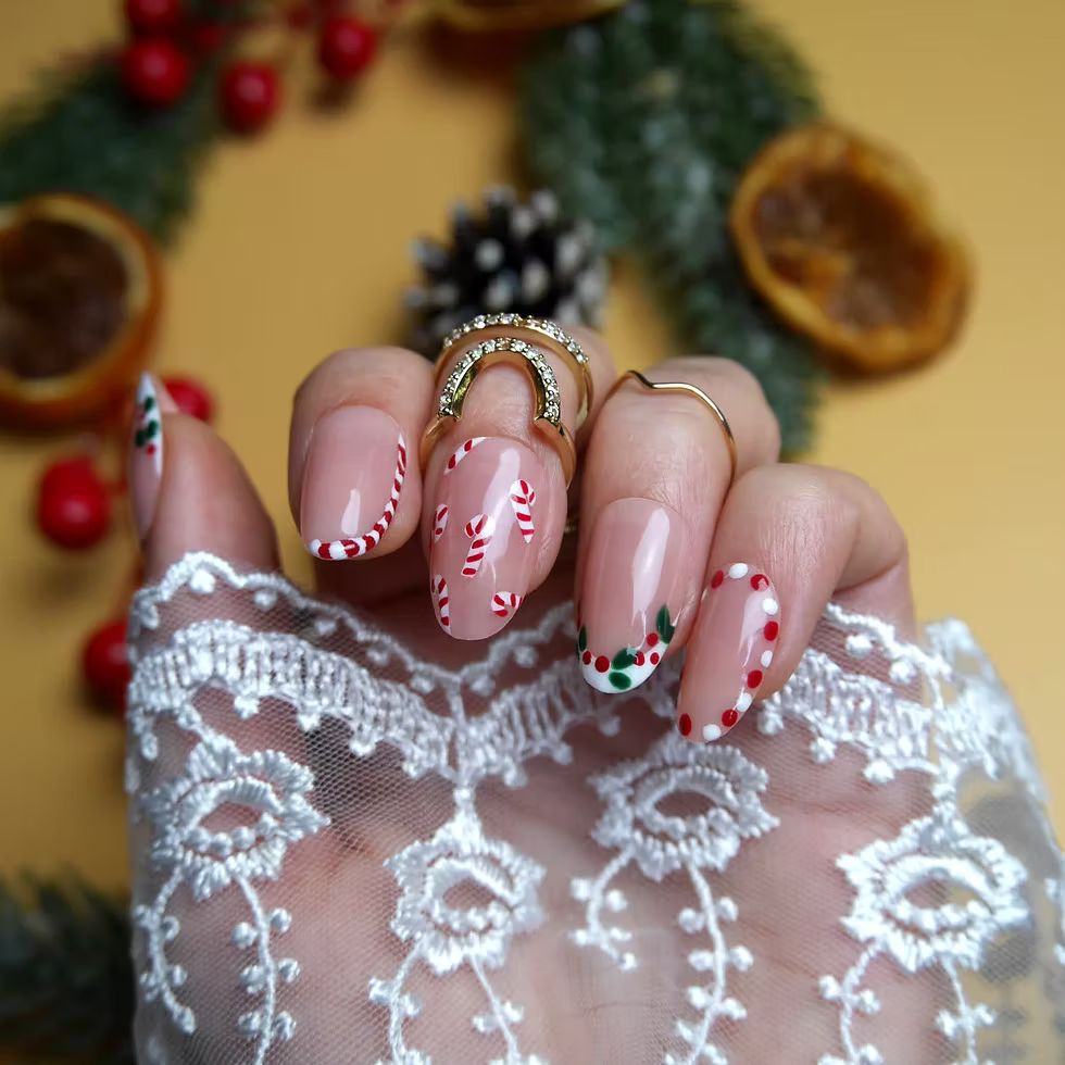 Playful Candy Cane Stripe Almond Nails Playful Candy Cane Stripe Almond Nails β Short Christmas Almond Nails 2026