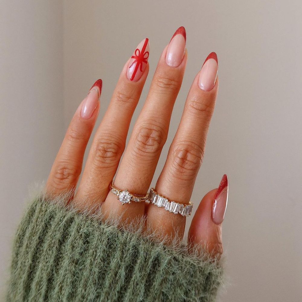Nude Base with Red Ribbon Bow Stilettos — Christmas Stiletto Nails 2026