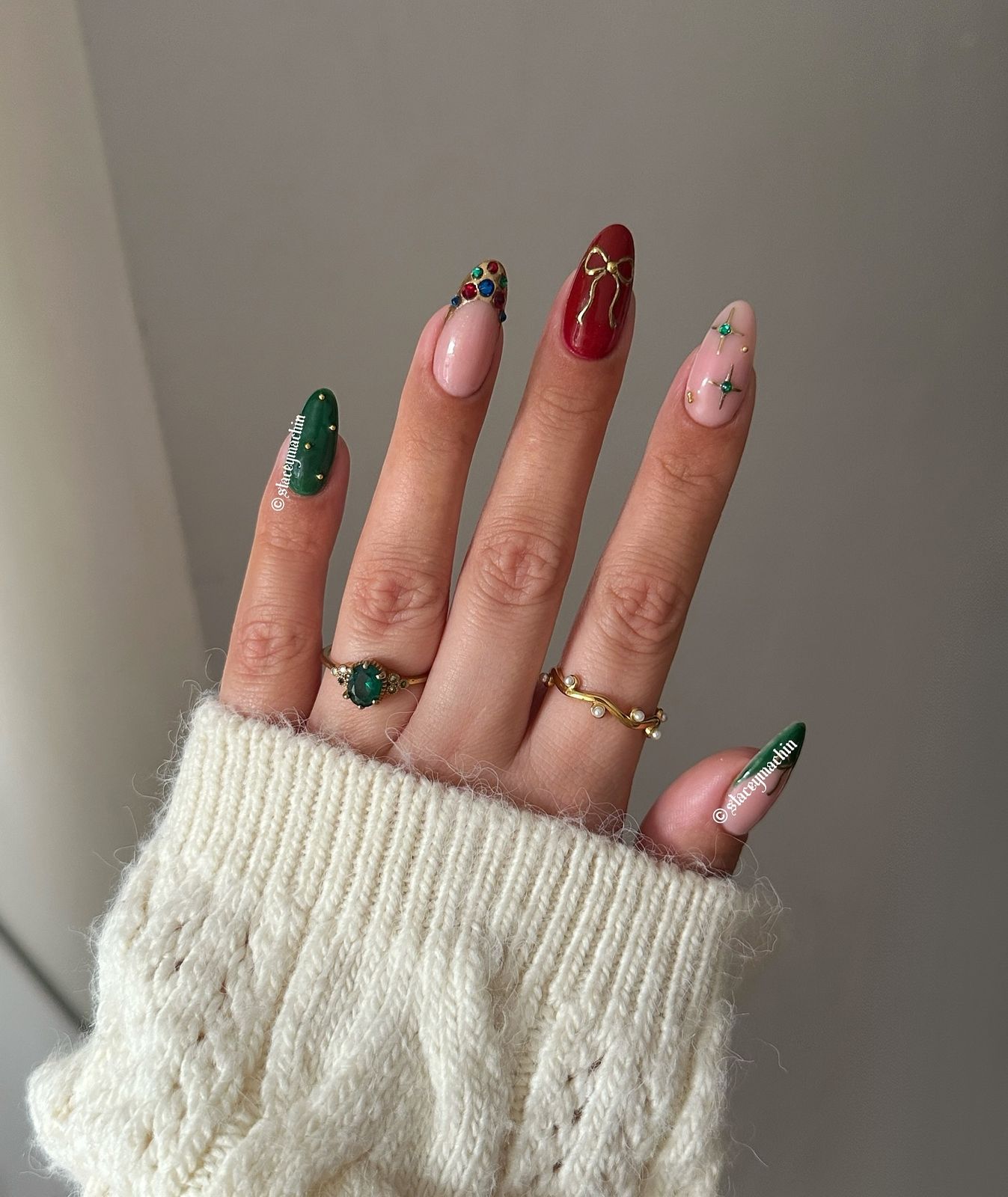 Nude Pink Almond Nails with Festive Accents Nude Pink Almond Nails with Festive Accents β Christmas Acrylic Nails 2026