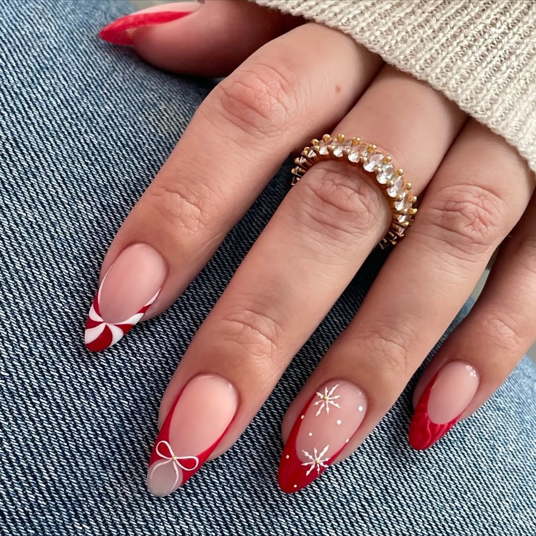 Almond Red French Tips with Snowflake Art Almond Red French Tips with Snowflake Art β Red Christmas Nails 2026