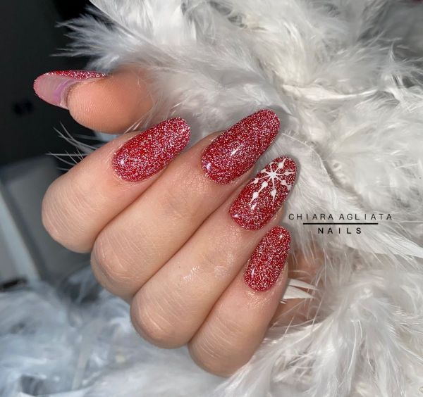 Long Oval Red Glitter with Snowflake Accent Long Oval Red Glitter with Snowflake Accent β Red Christmas Nails 2026