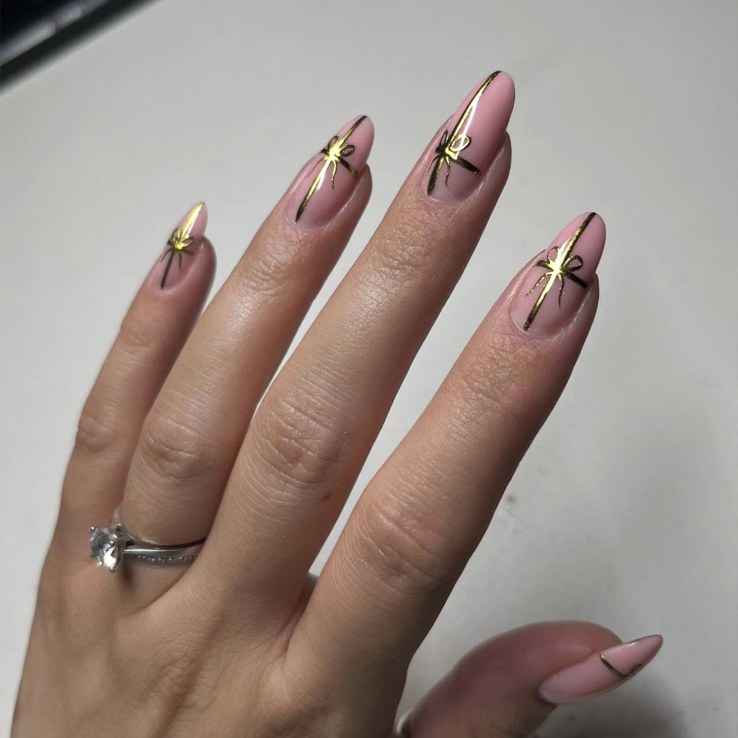 Burgundy Bow Almond Nails — Christmas Nails for Women Over 50 2026