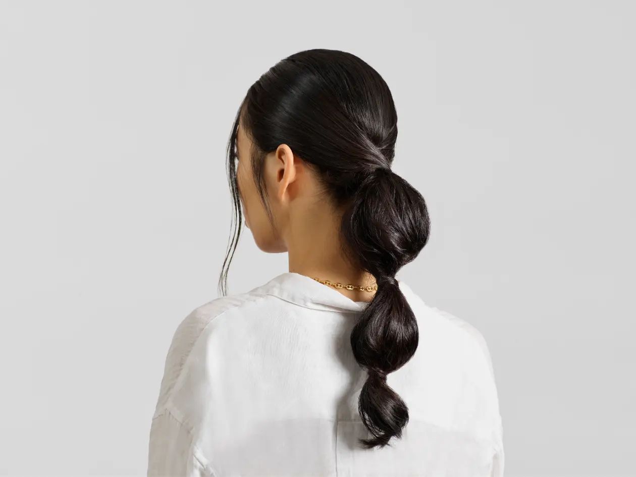 Playful Bubble Ponytail — Winter Hairstyles for Long Hair
