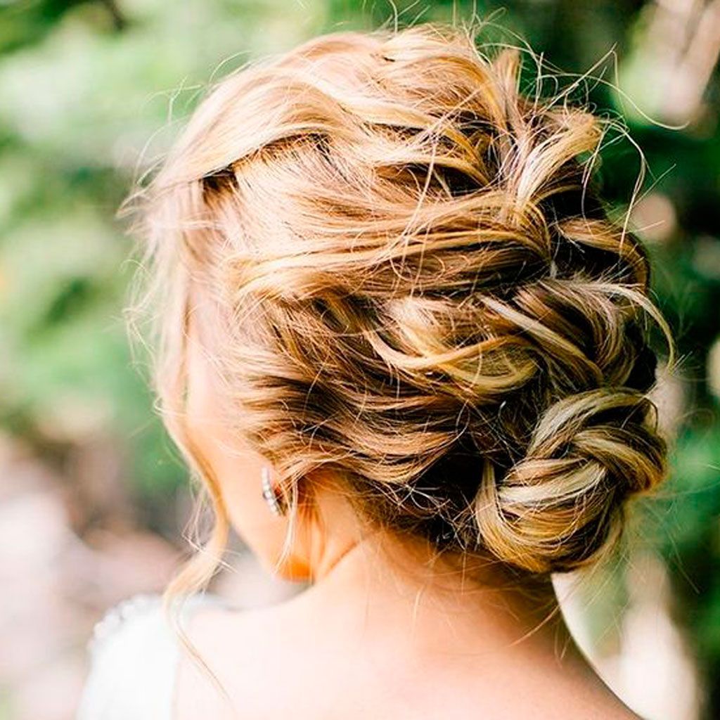 Sleek High Bun with Black Ribbon Bow Sleek High Bun with Black Ribbon Bow β Winter Party Hairstyles