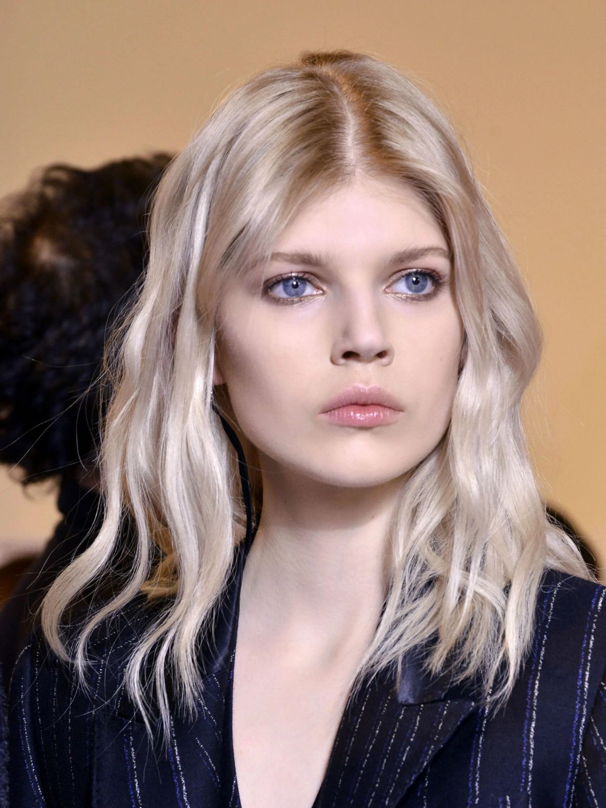 Tousled Shoulder-Length Waves With Curtain Bangs — Winter Date Night Hairstyles