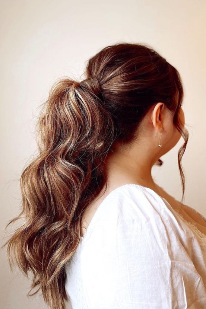 High Ponytail With Voluminous Waves — Winter Date Night Hairstyles