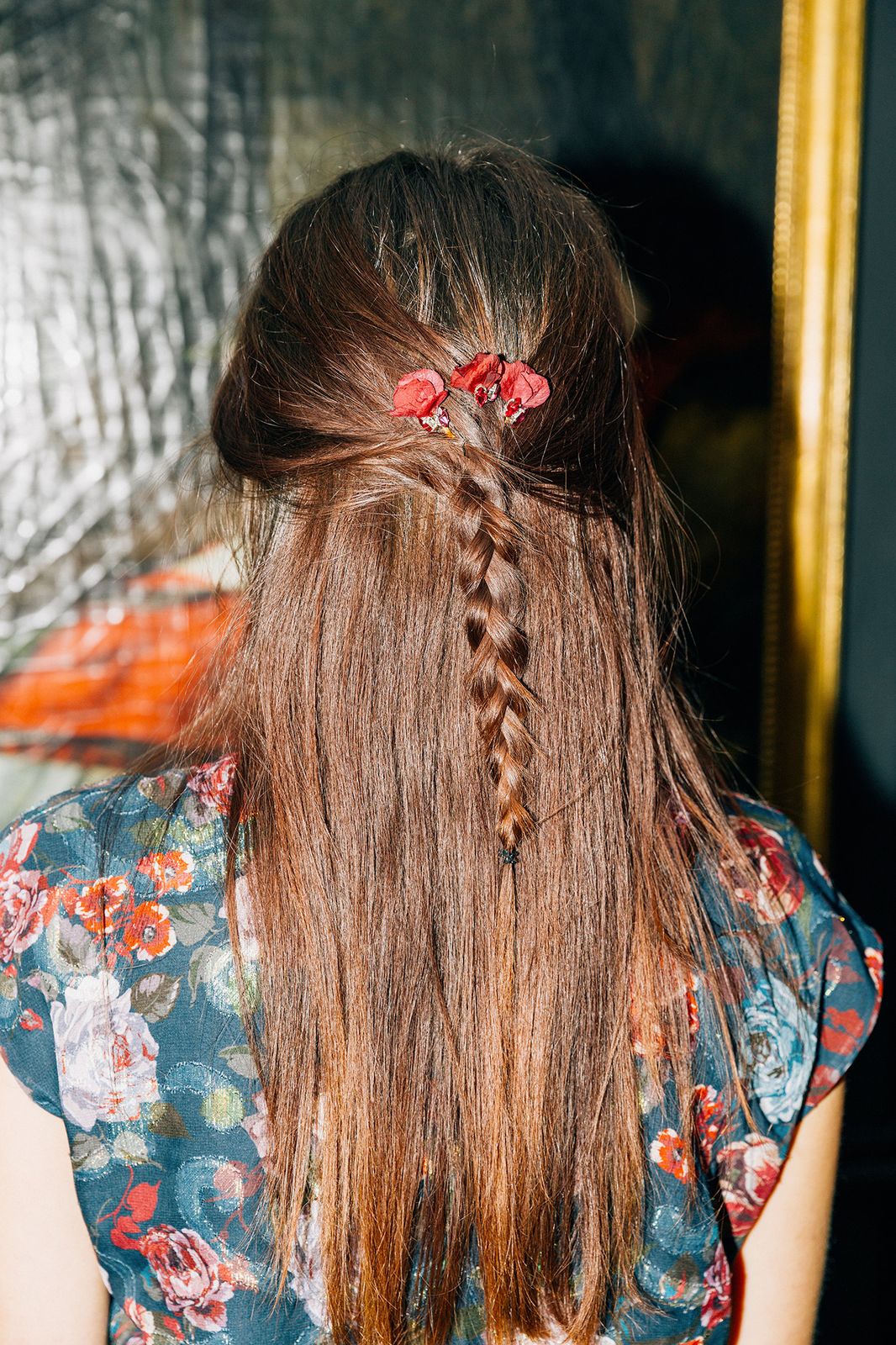 Loose Braid With Floral Pins — Winter Hairstyles for Thick Hair