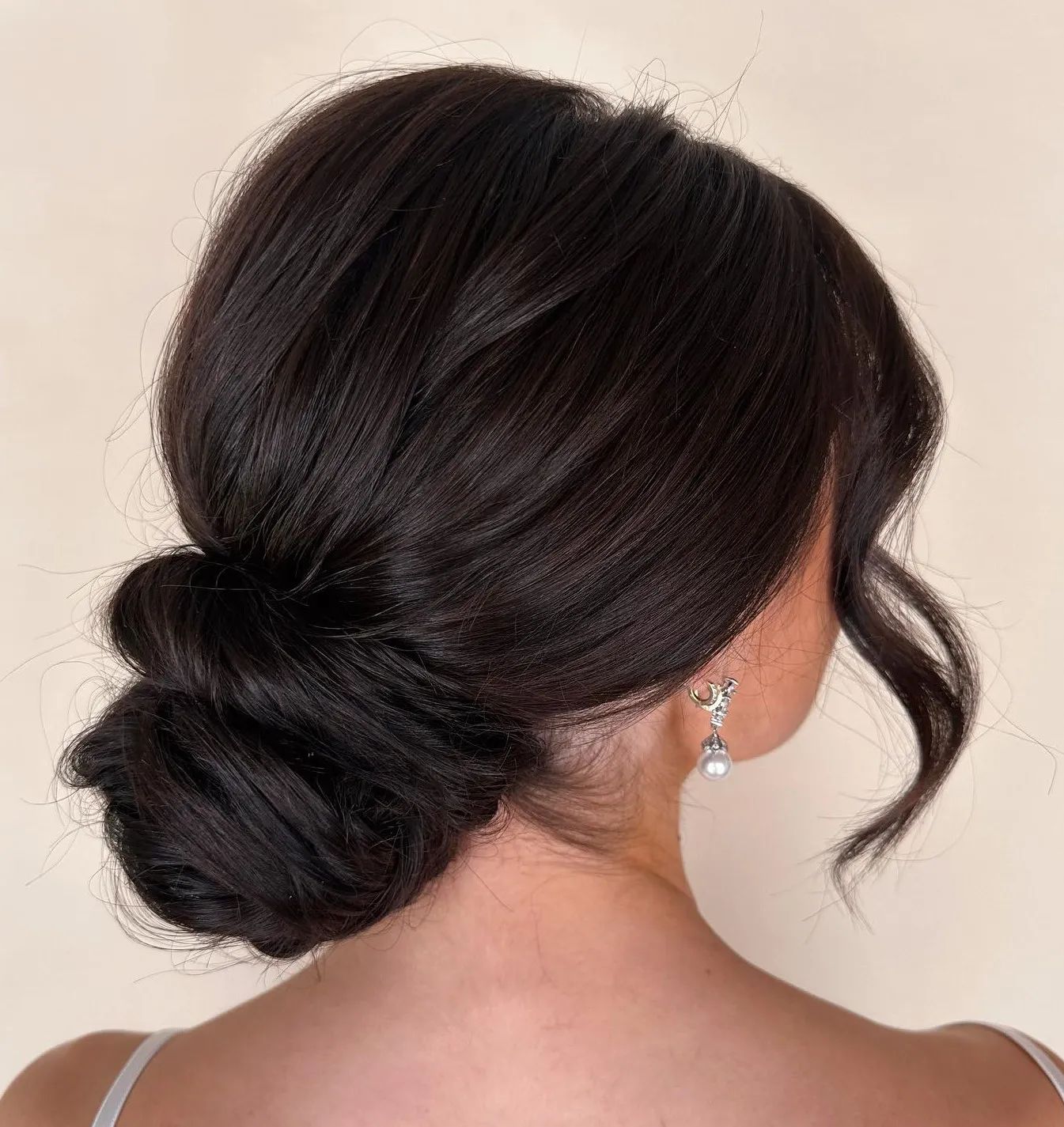 Smooth Dark Brown Low Chignon — Winter Hairstyles for Thick Hair