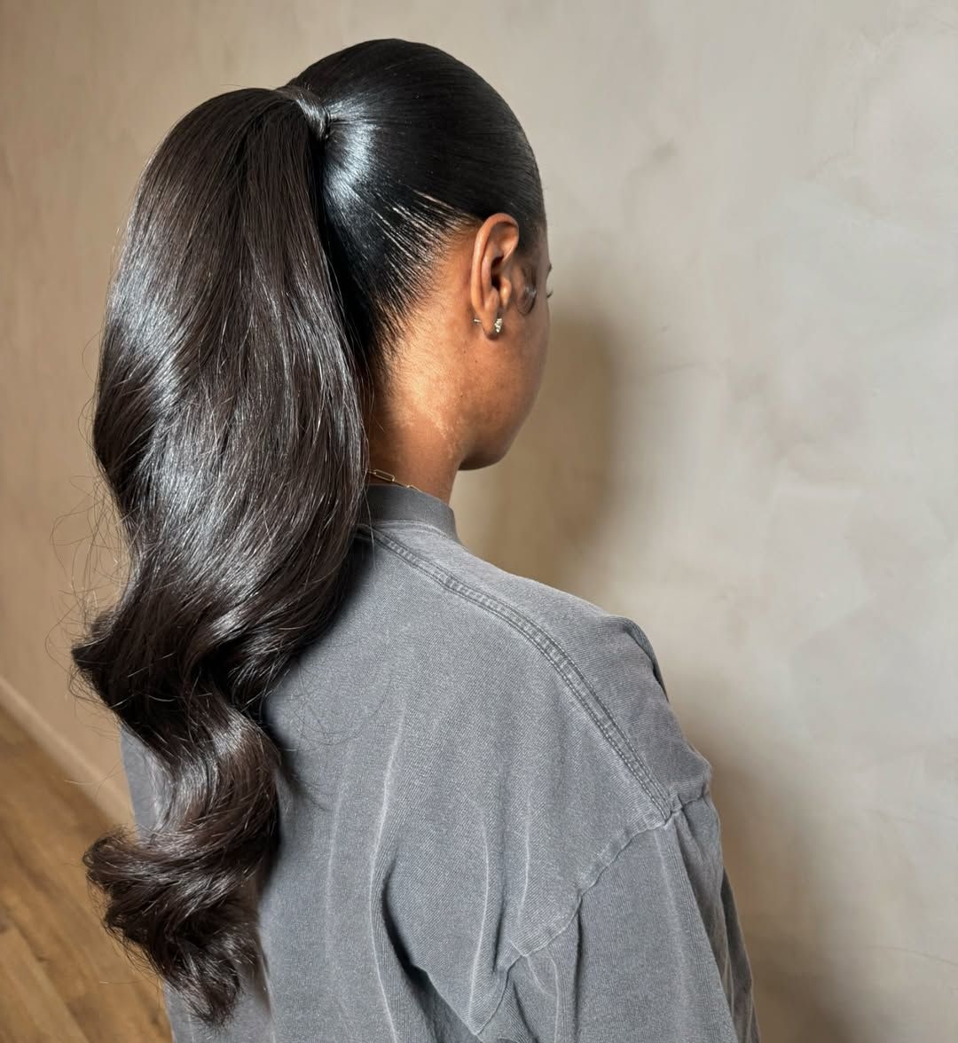 Sleek High Ponytail With Dramatic Waves Sleek High Ponytail With Dramatic Waves β Winter Party Hairstyles