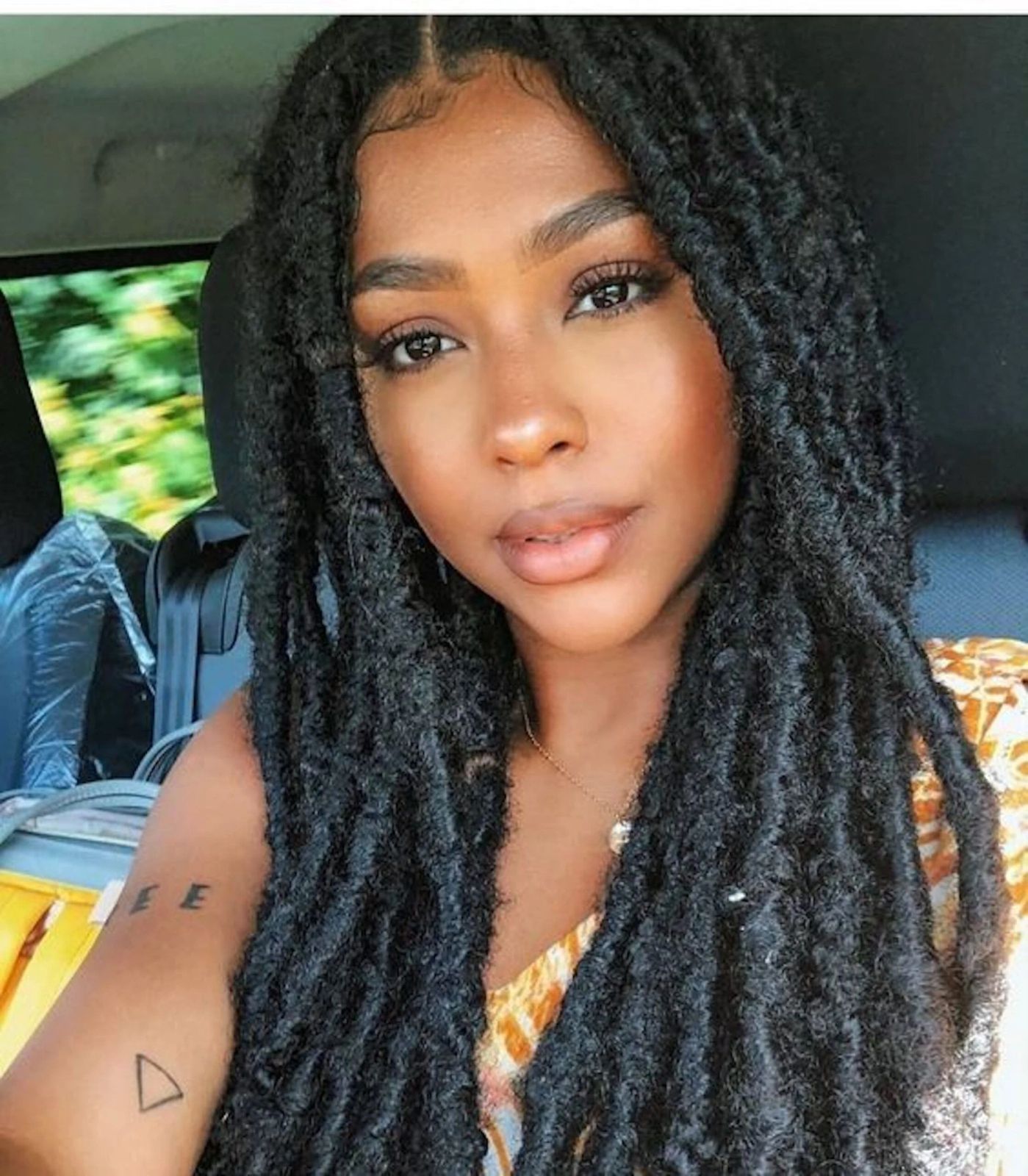 Mid Back Faux Locs With Middle Part Mid Back Faux Locs With Middle Part β Winter Braids for Black Women