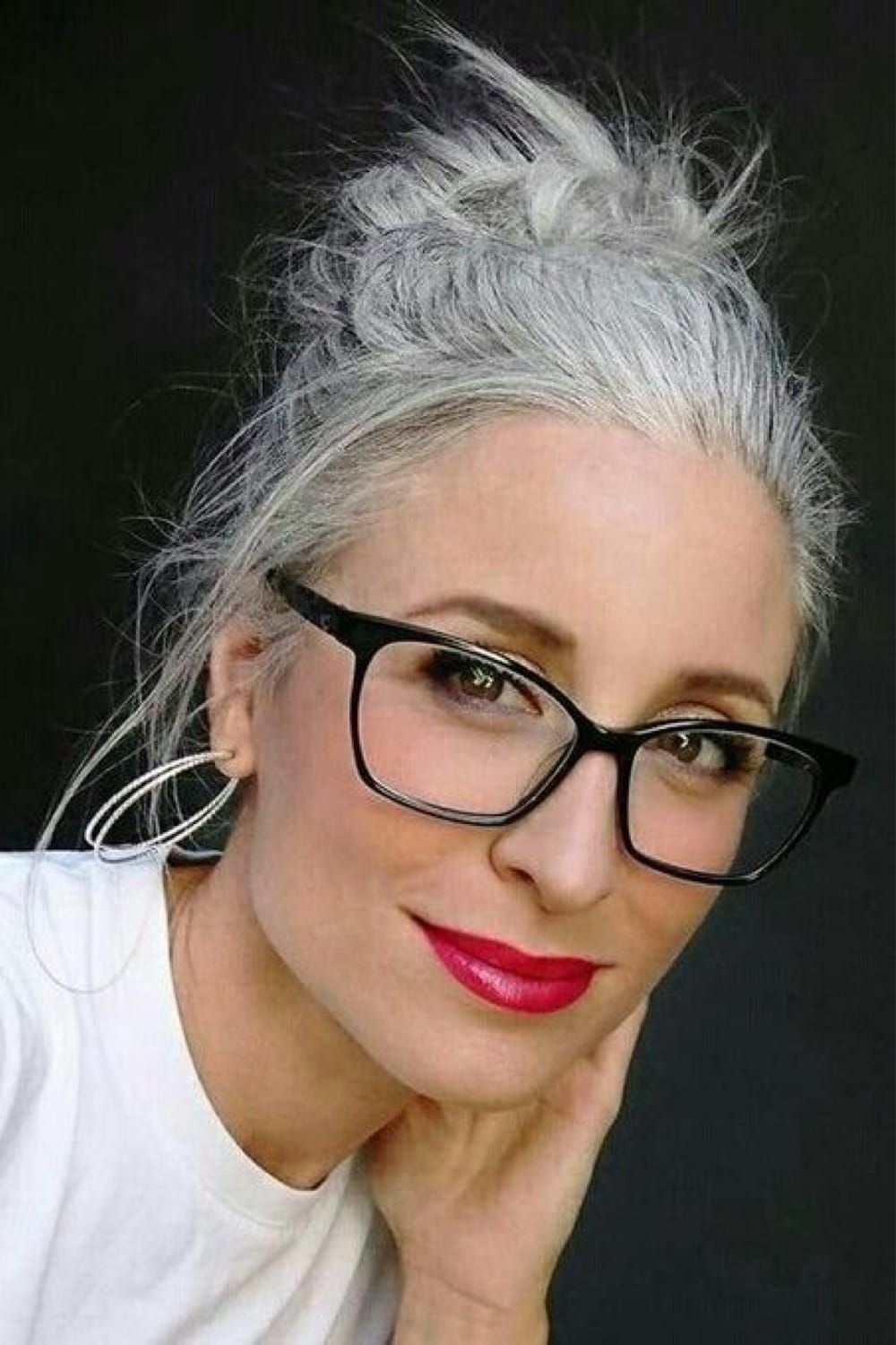 Visual Idea — A Messy Bun Hairstyle Showcases Fine — Winter Hairstyles for Gray Hair