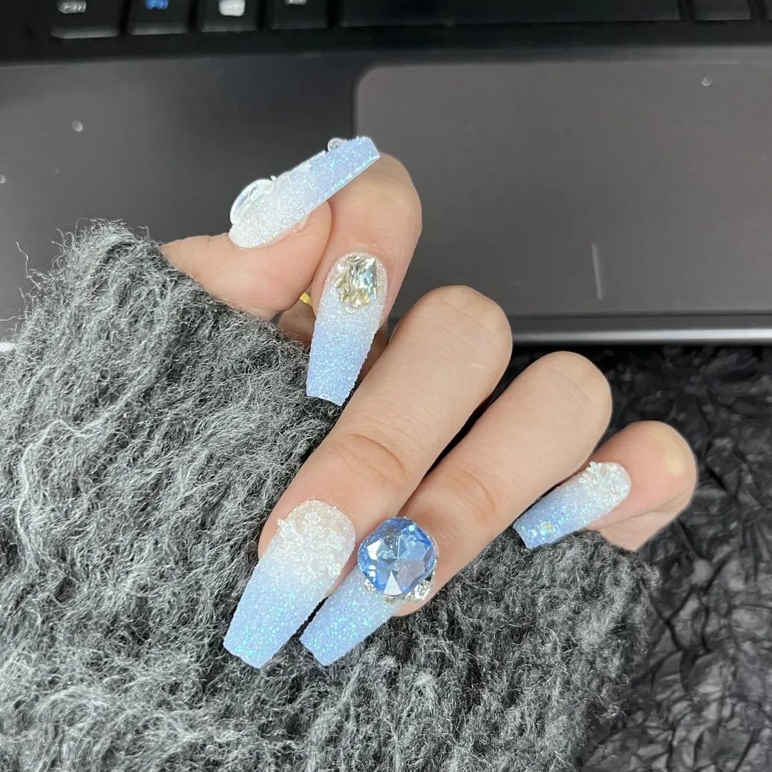 Blue to White Glitter Gradient Rhinestone Coffin Nails Blue to White Glitter Gradient Rhinestone Coffin Nails β Sparkly Winter Nails