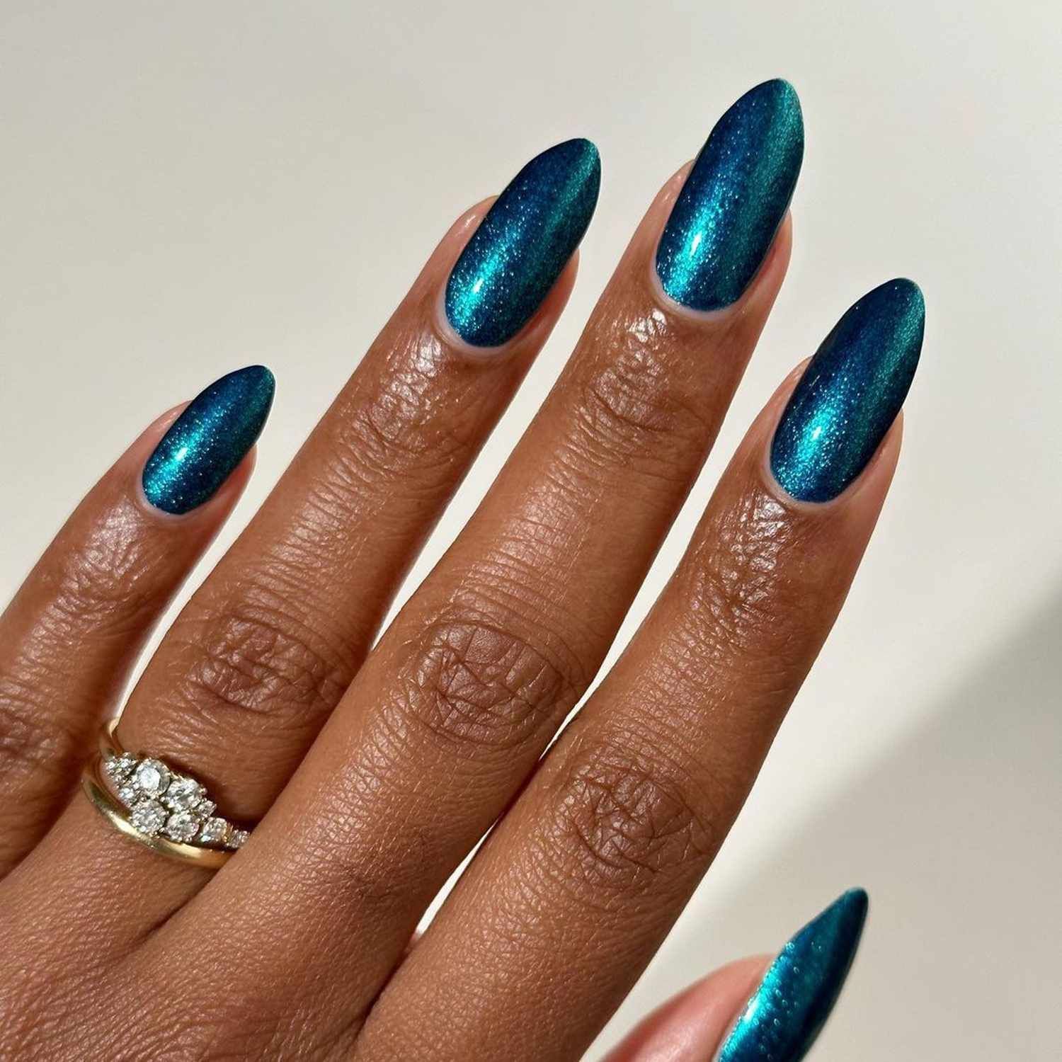 Medium Oval Shimmering Teal Nails Medium Oval Shimmering Teal Nails β Winter Nails for Black Women
