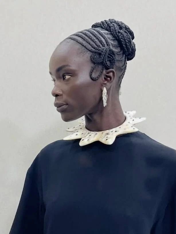 High Bun With Decorative Swirls High Bun With Decorative Swirls β Winter Knotless Braids