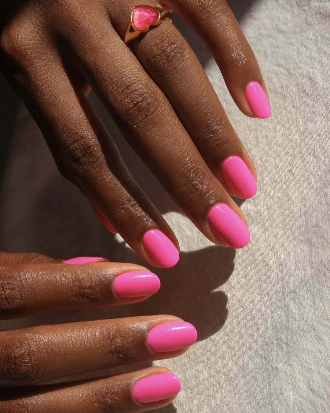 Short Oval Bright Pink Glossy Nails Short Oval Bright Pink Glossy Nails β Winter Nails for Black Women