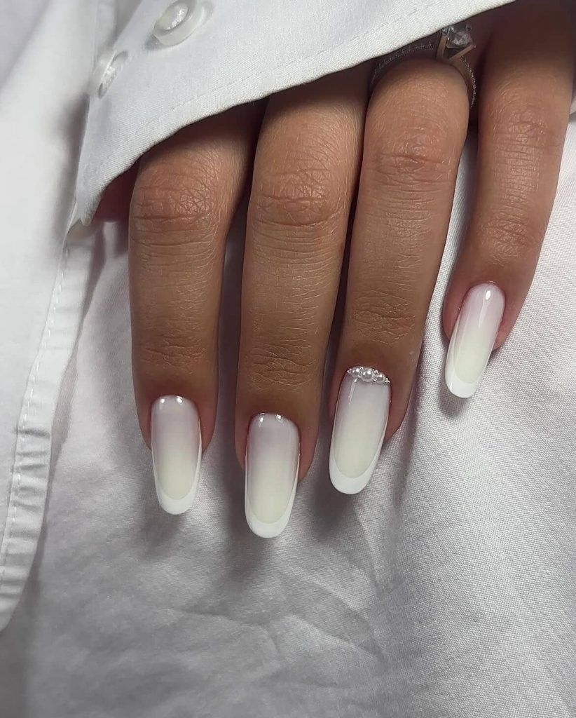 White to Sheer Pink Gradient with Pearl Cuticle Accent — New Years Gel Nails 2027
